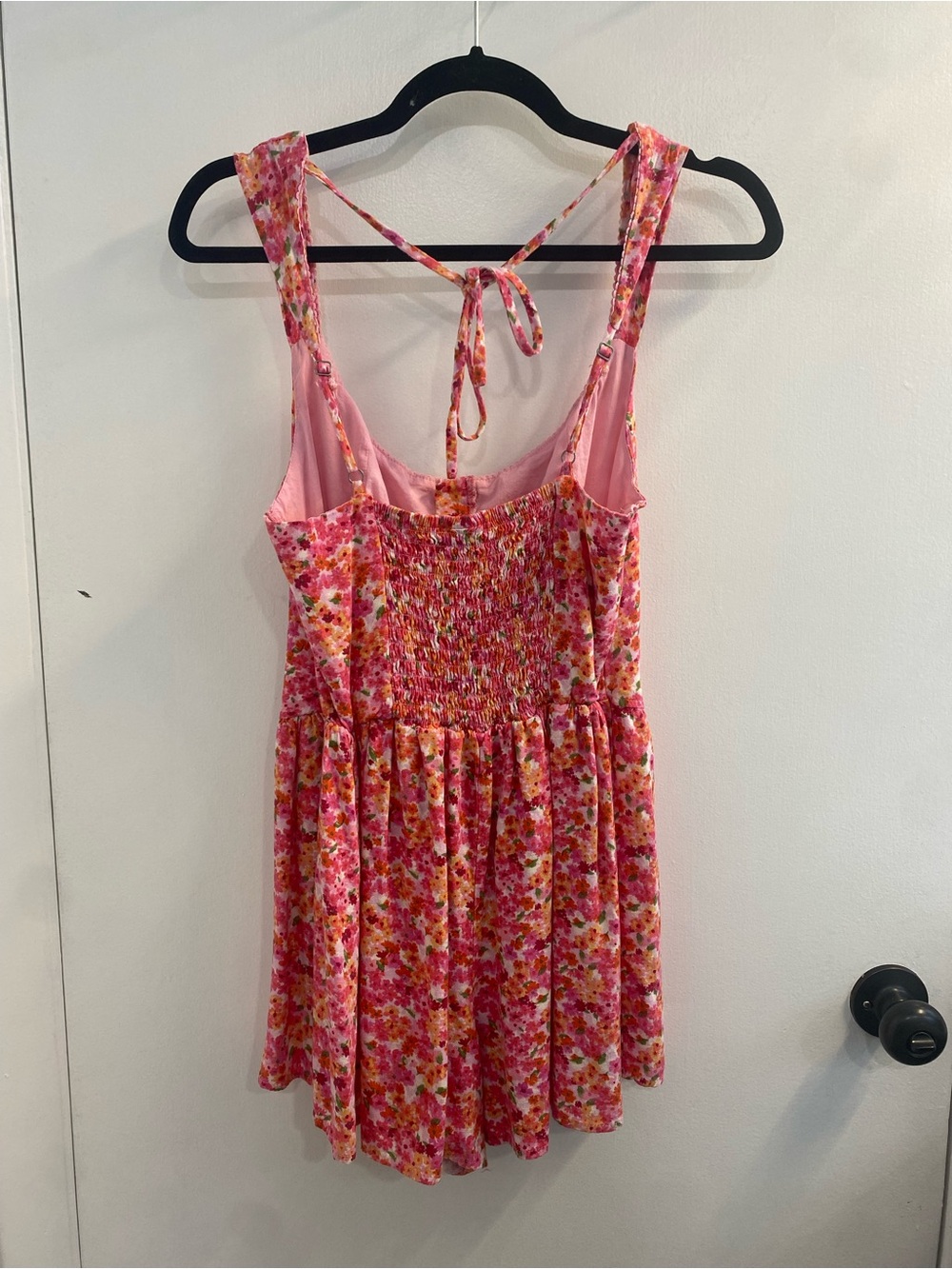 Wild Fable Target brand Pink Floral Smocked Romper with claps in front